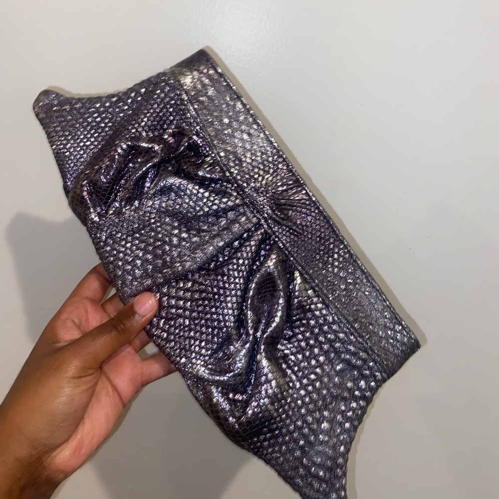 silver clutch brand new never used Lauren merkin